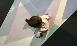 A child playing with craft materials