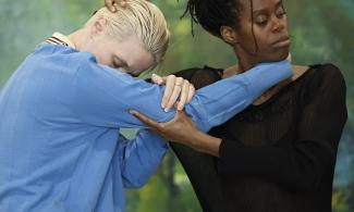two dancers in embrace
