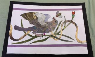 A white sheet of paper with a black border displays a pietra dura-style design, featuring shiny gold, green, and colourful paper pieces.