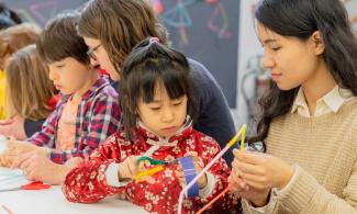 mother and daughter take part in creative activities 