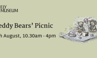 A drawing of teddy bears having a picnic on a green coloured background with the words Teddy Bears' Picnic