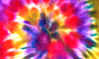A bright swirled tie dye pattern of different colours.