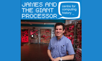 James Newman the creator of the Megaprocessor standing in front of the Megaprocessor exhibit at The Centre for Computing History.