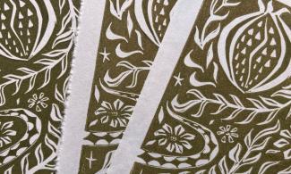 Green and white illustrations of leaves, flowers and fruit.