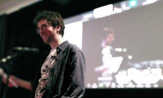 Image showing performer on a stage doing karaoke 