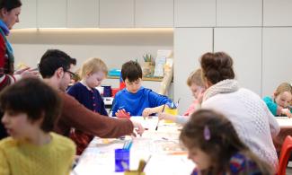 Children and families drawing in a workshop at Kettle's Yard.