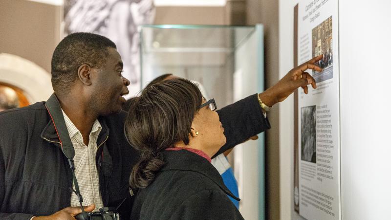 Visitors looking at art