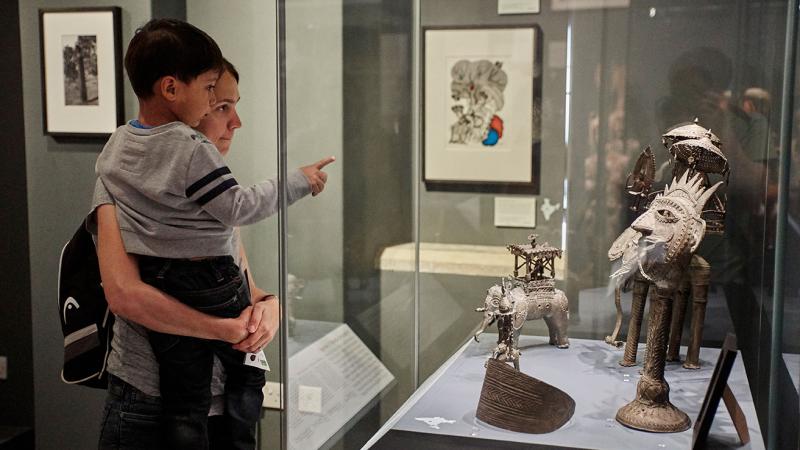 visitor and child exploring the displays