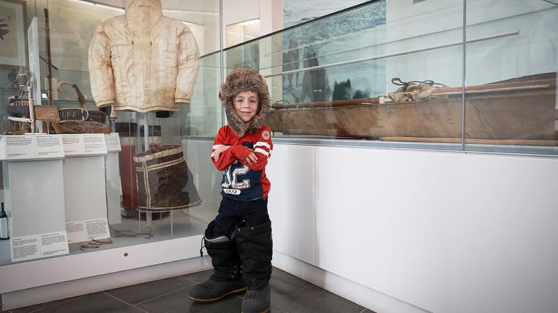 A child dresses in Polar gear