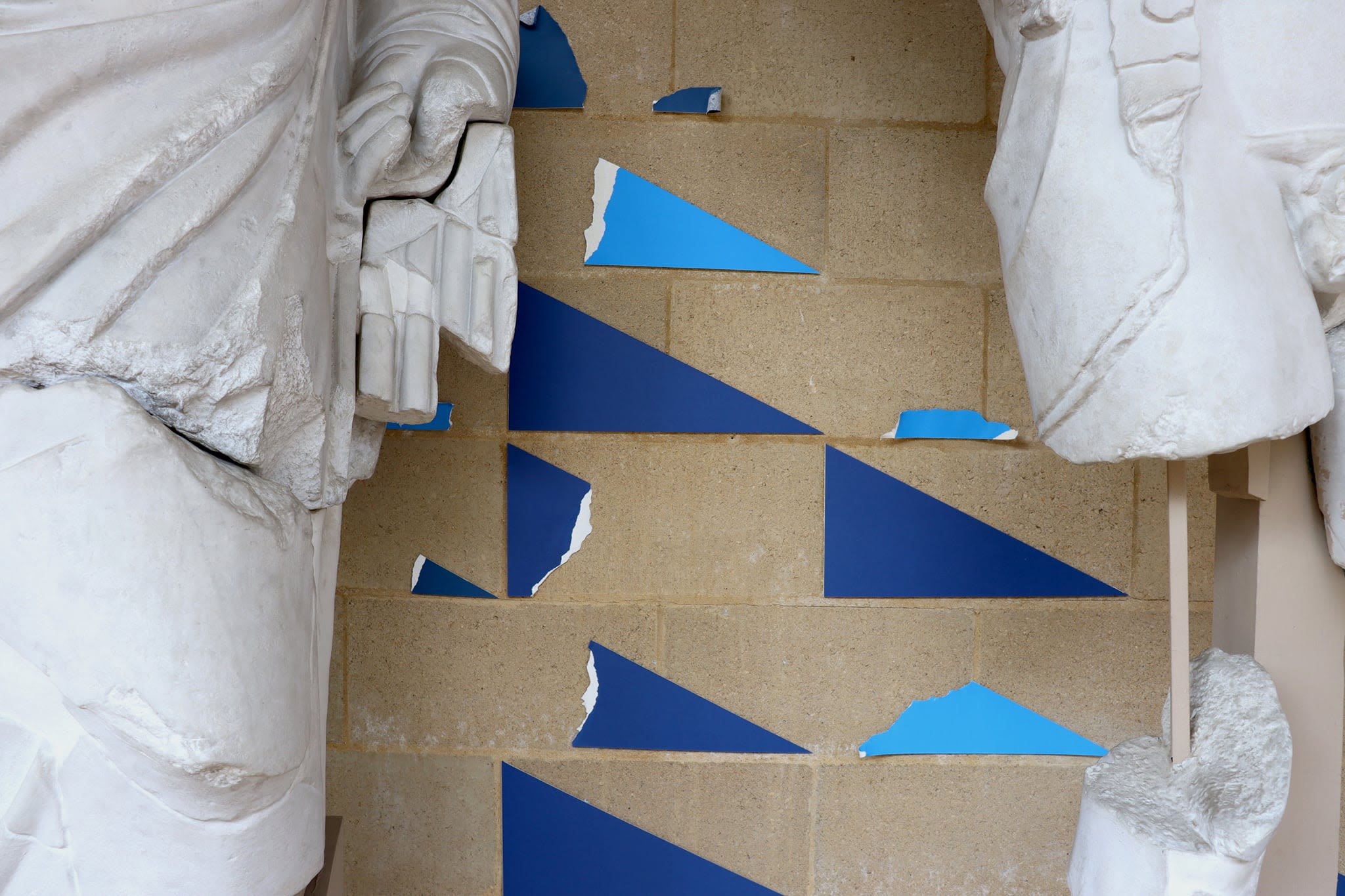 Triangles and ripped mountboard between two casts