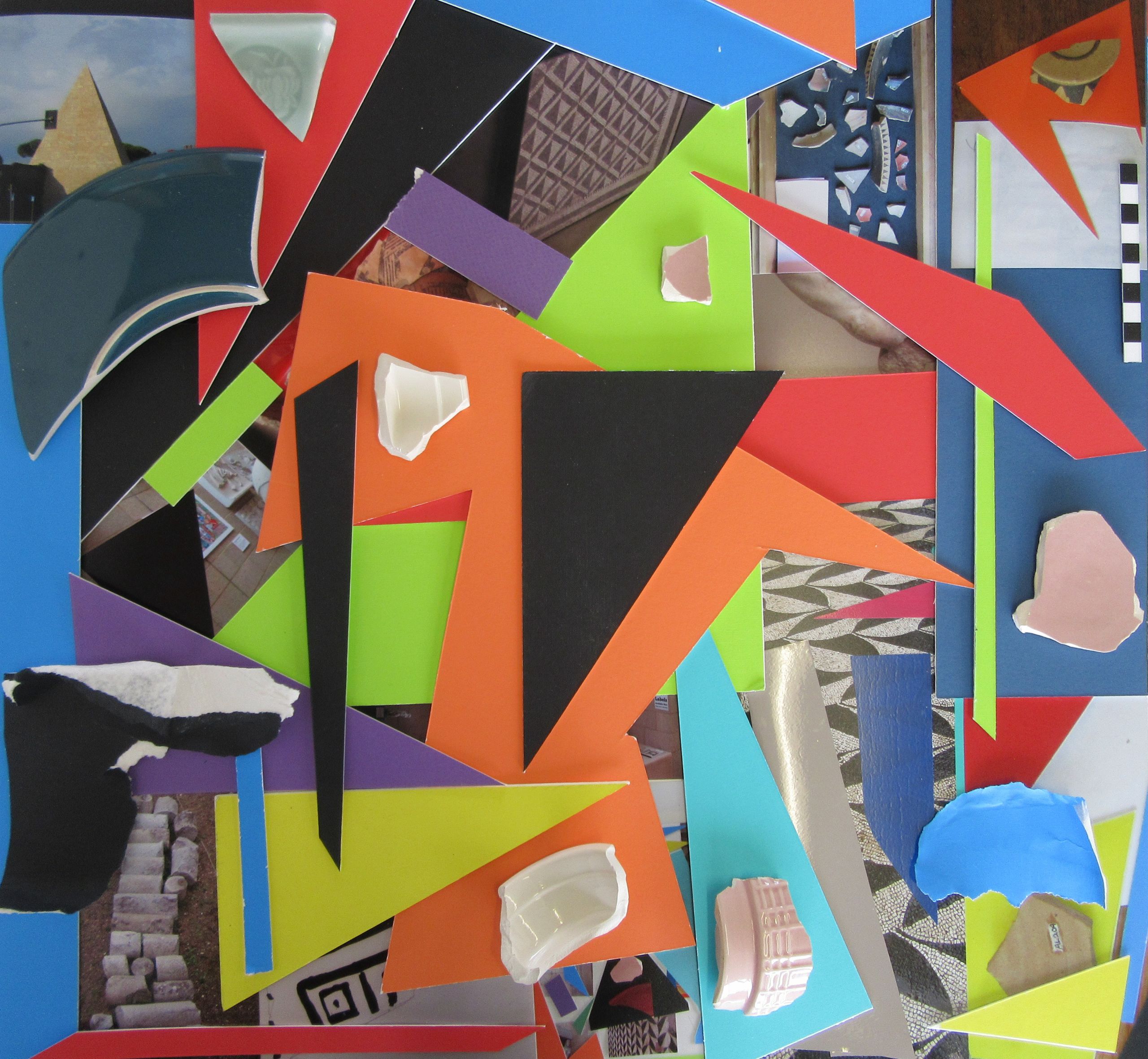 Mixed media. Coloured mountboard, photographs and broken ceramics arranged around each other.