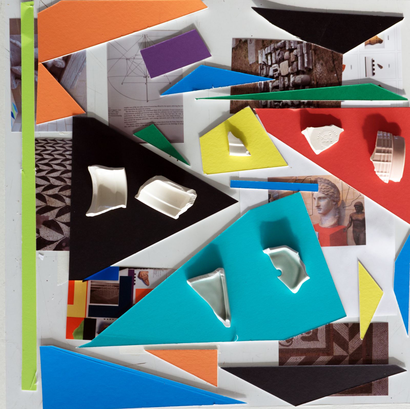 Mixed media. Coloured mountboard, photographs and broken ceramics arranged around each other.