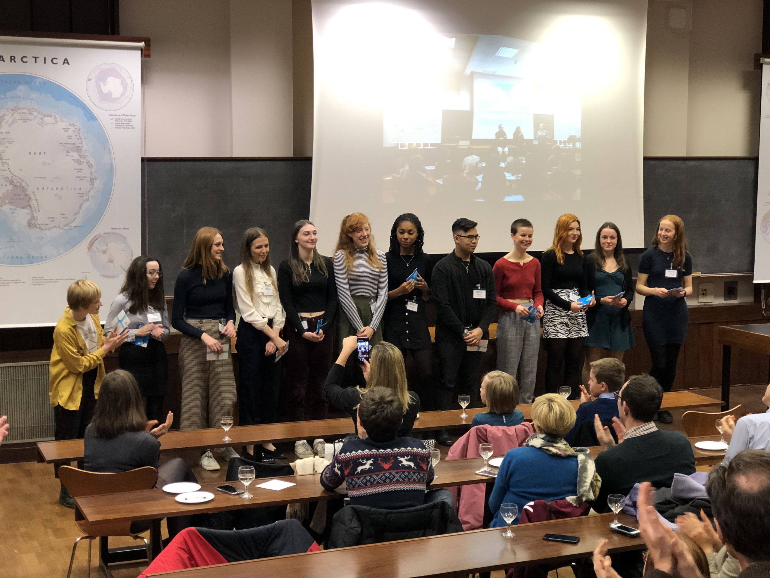 Students presenting to an audience in the Polar Museum