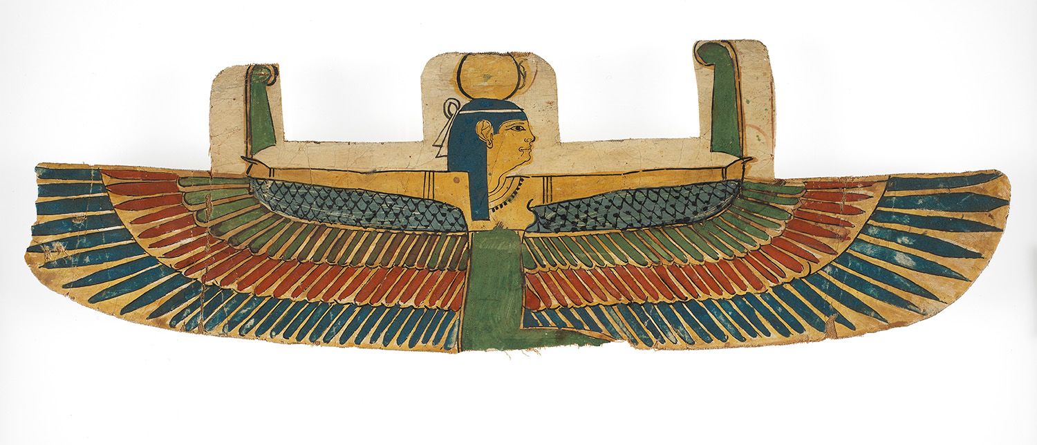 Nut holds feathers in her hands and wears a sun disc on her head. Her skin is painted in yellow orpiment, the feathers are Egyptian blue and green, the light blue is a combination of Egyptian blue and lead white, and the red is cinnabar.
