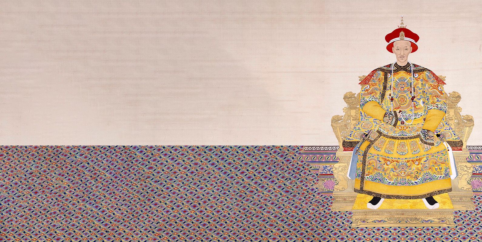 Imperial portrait of an Emperor wearing an elaborate yellow cloak and clothing, with blue and red detailing seen. He wears a bright red crown/hat, and is sat on a gold chair. The floor is highly detailed in purples and yellows, and the background a plain pink-cream.