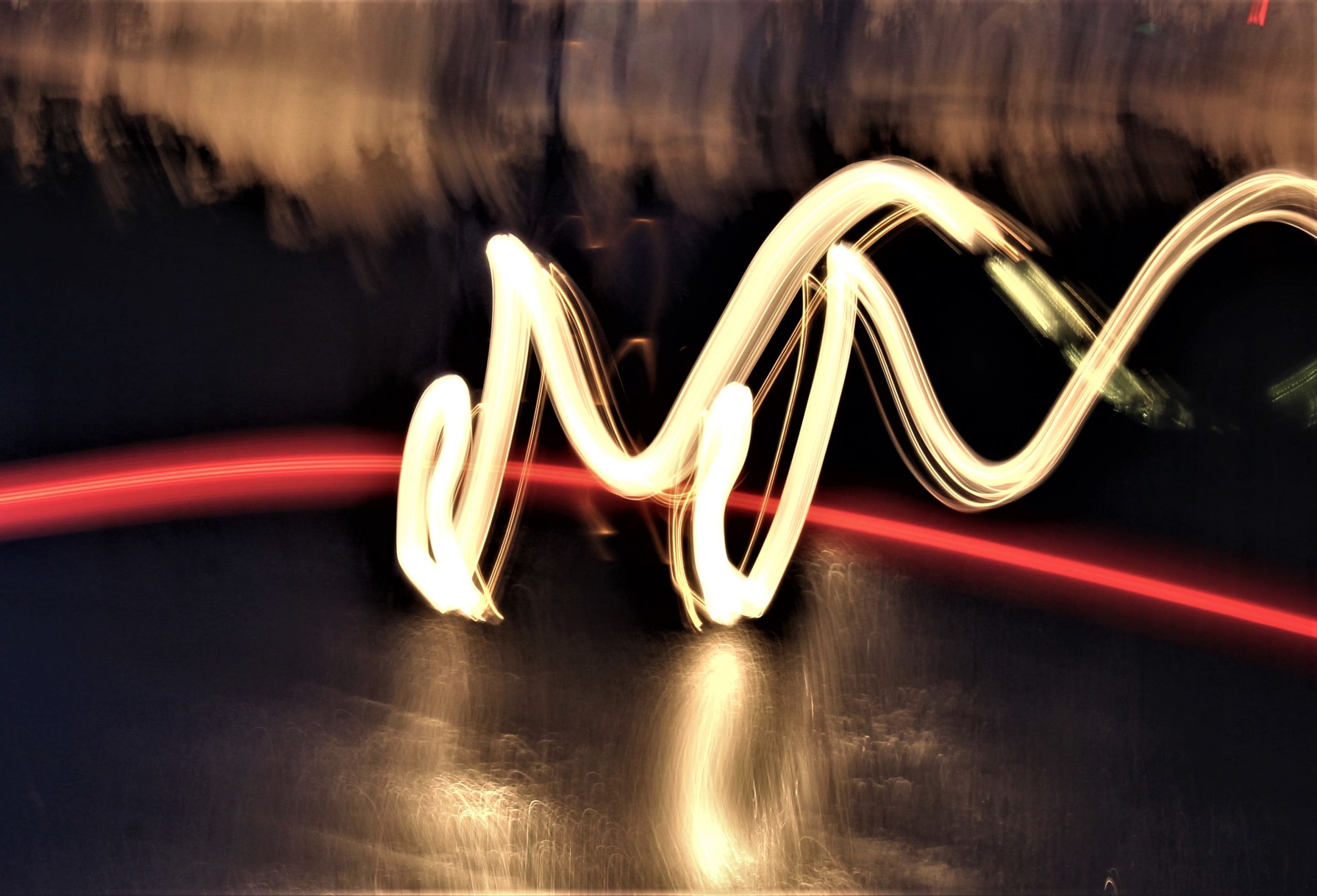 abstract light capture in the shape of the letter M